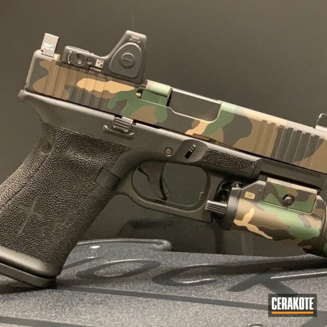 Cerakoted Custom Glock With A Cerakote Woodland Multicam Finish