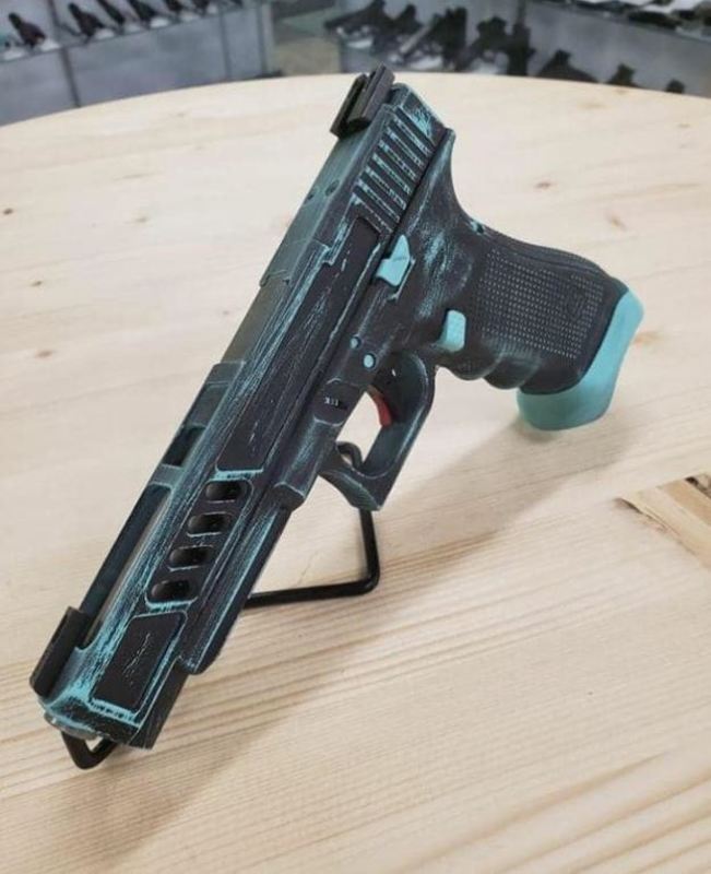 Cerakoted Glock Cerakoted Using Graphite Black And Robin's Egg Blue